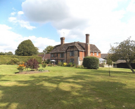 Listed farmhouse and buildings